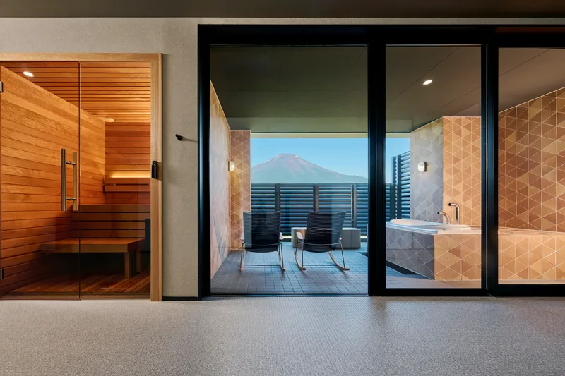 Cala indoor sauna integrated into a mountain-view wellness room