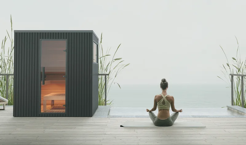 Garda outdoor sauna beside an infinity pool and meditation deck