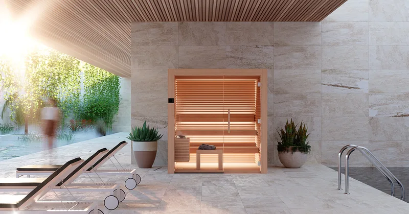 A pale timber sauna in a sunlit stone spa